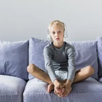 ©little boy listening music home 700px